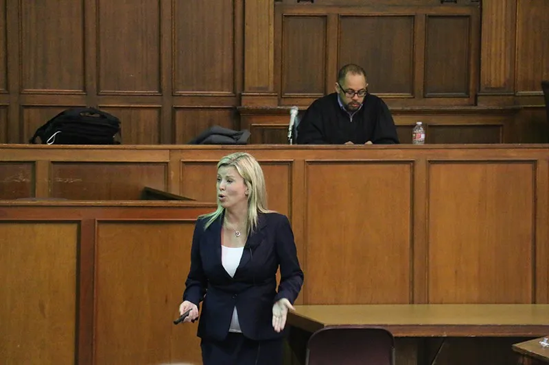 A federal defender in San Diego teaches trial skills during a mock trial and training workshop at the California Western School of Law.